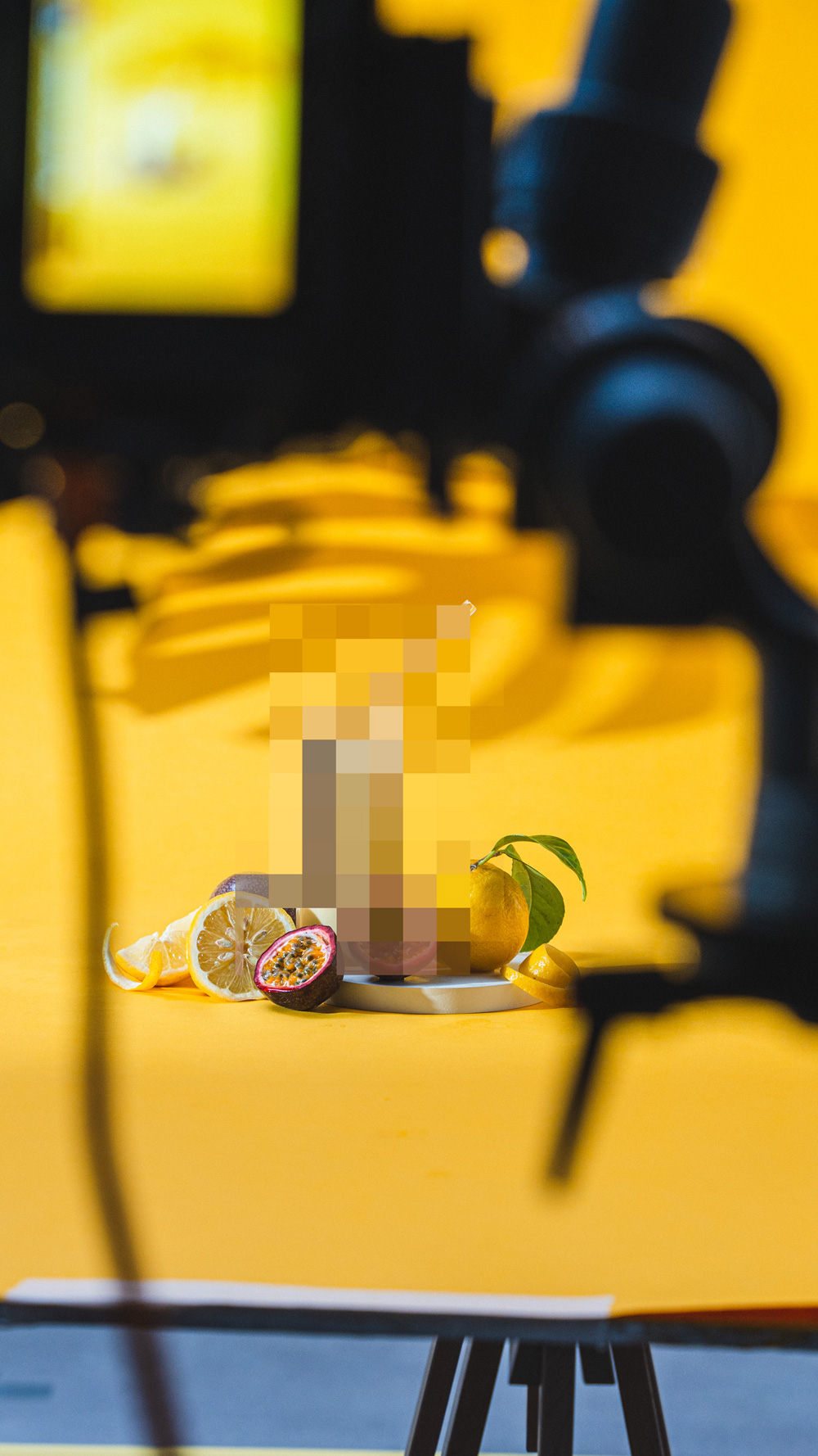 Behind the scenes on a yellow-set product shoot with citrus fruit