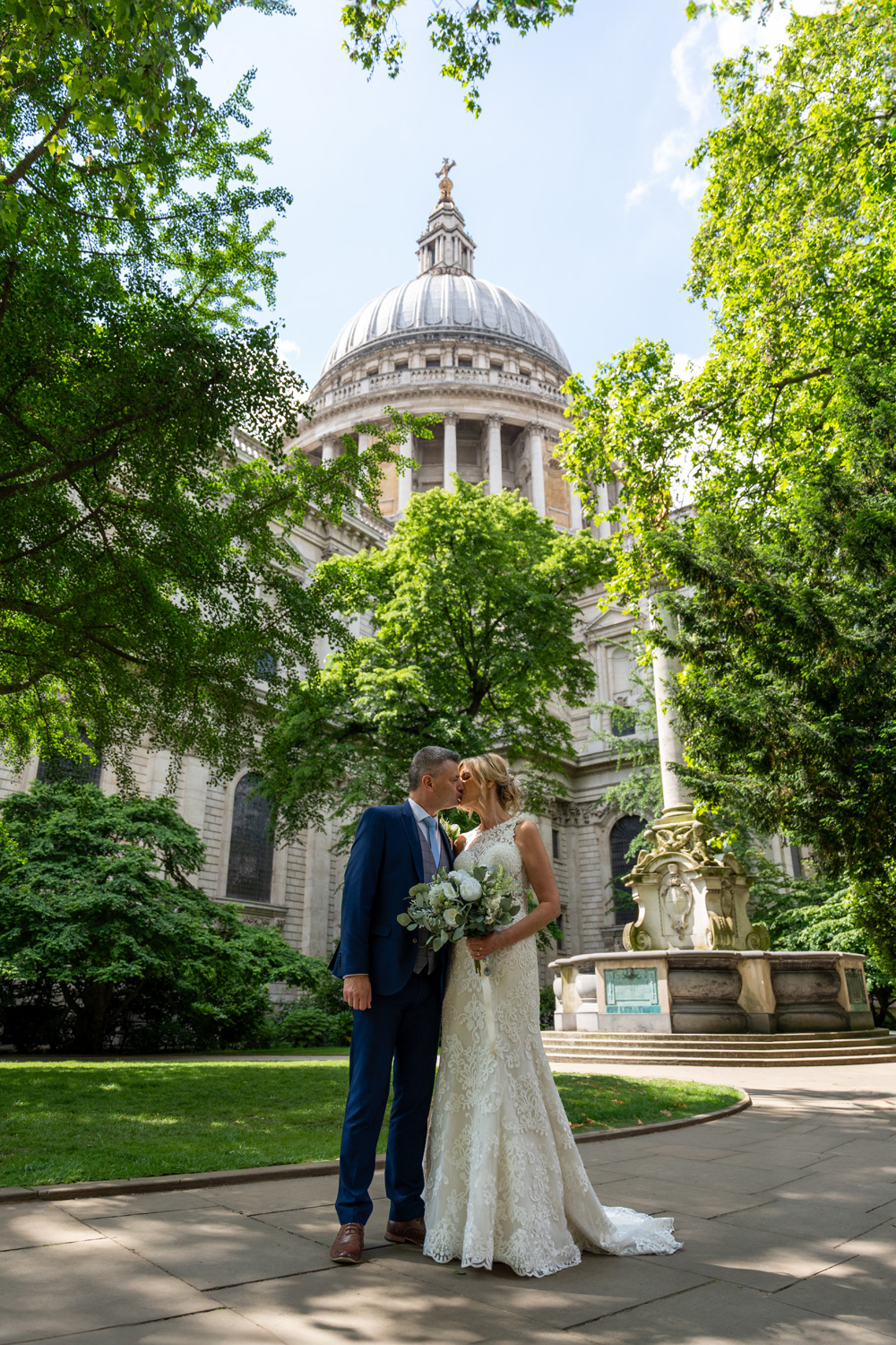 Dad and Amanda kissing outside St Paul's Cathedral