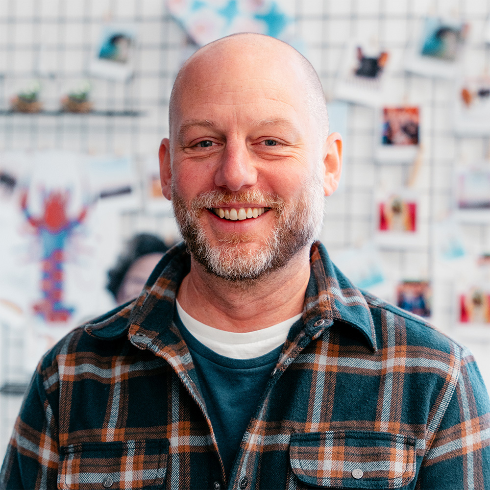 Headshot of a colleague, office setting