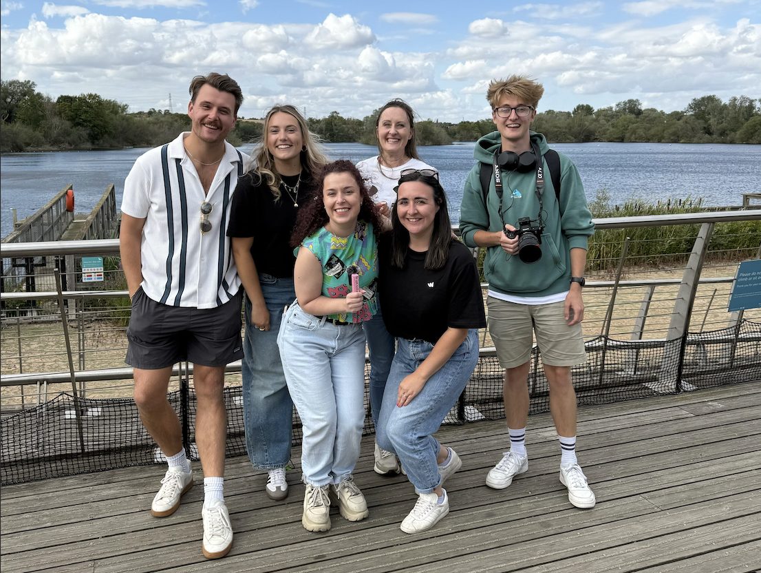 The crew together on the boardwalk at Rushden Lakes