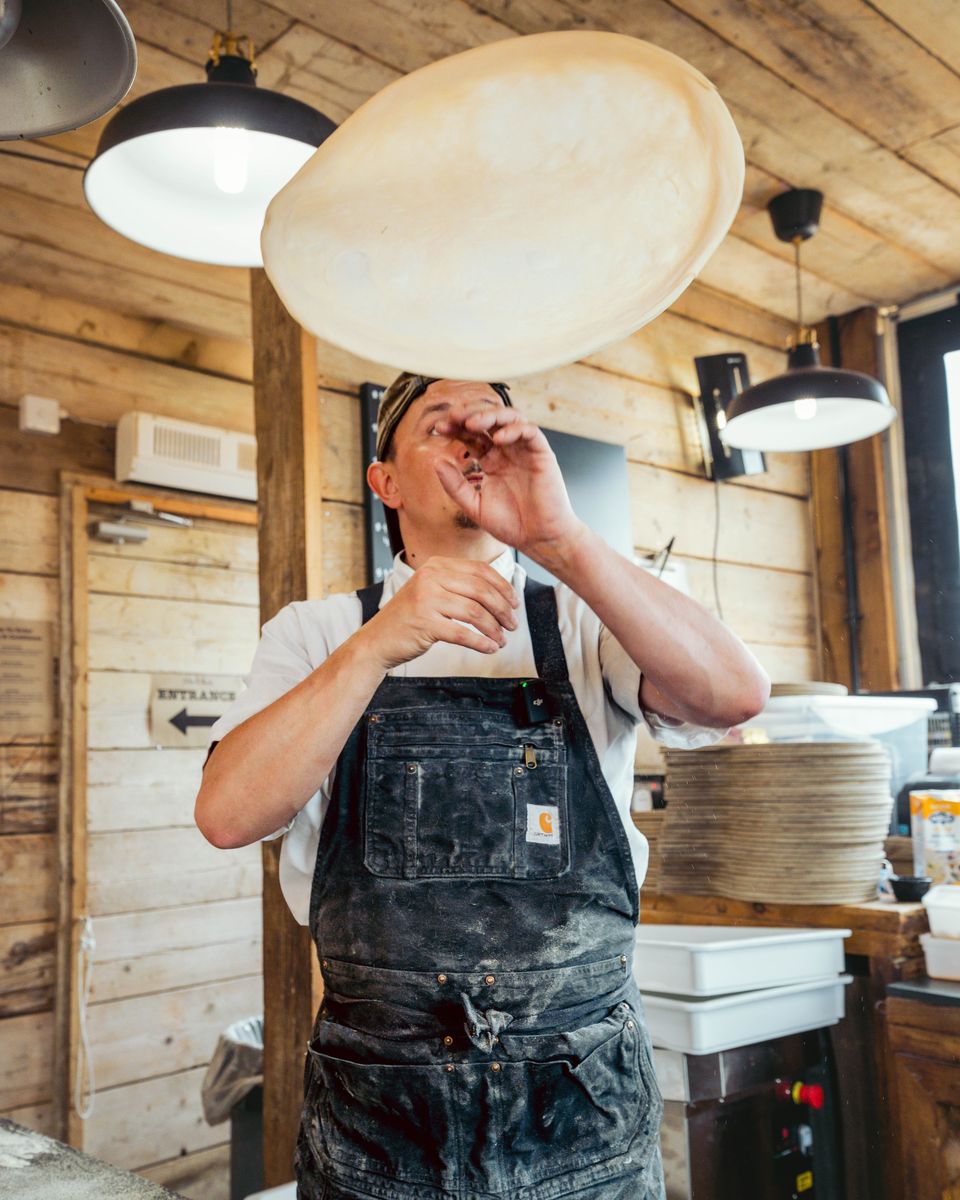 Chef tossing pizza dough, Tastemakers series