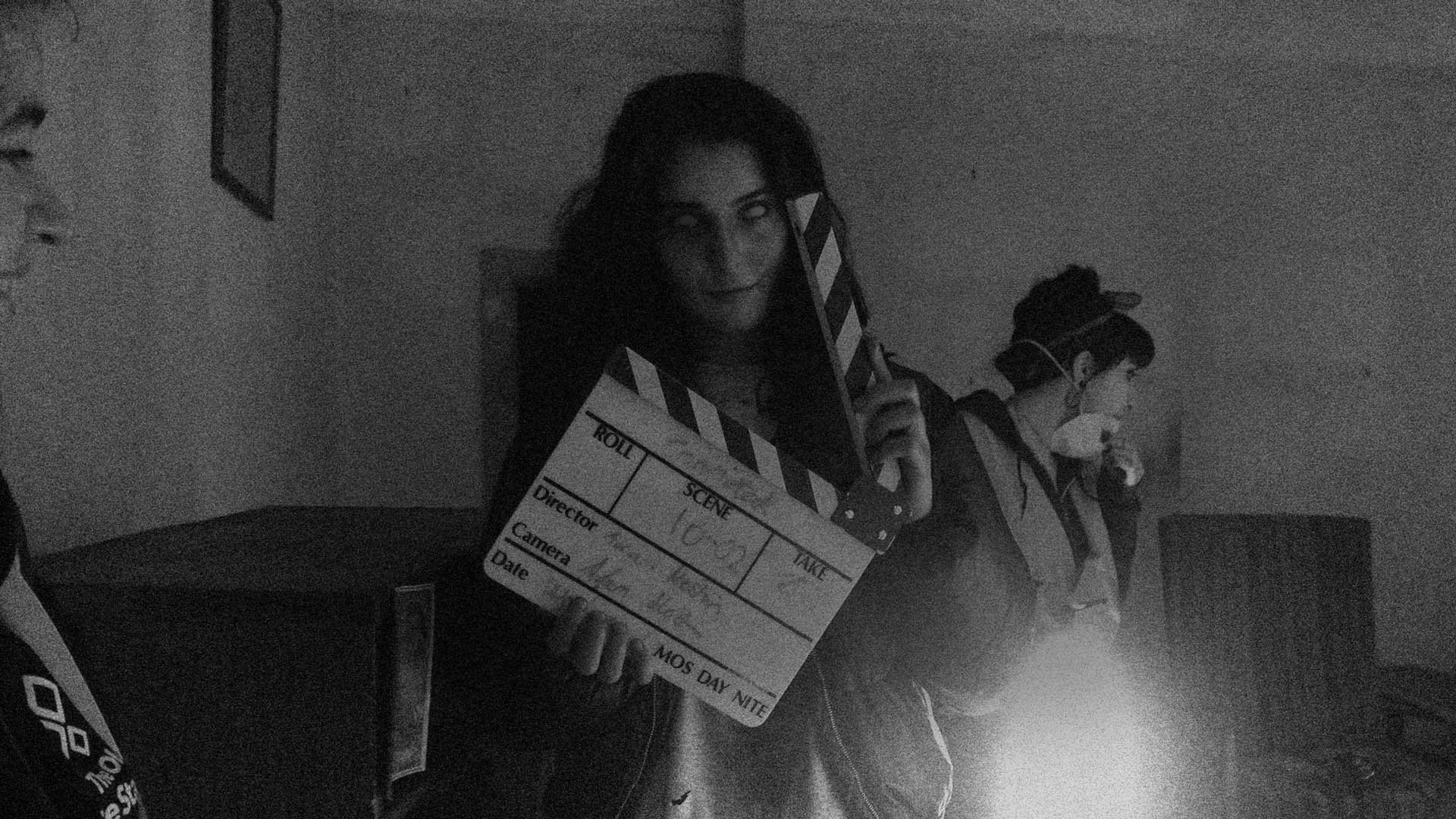 Between takes, clapperboard